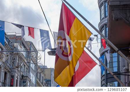 Galatasaray SK flag hanging in downtown Istanbul, Turkiye Galatasaray SK flag hanging in downtown Istanbul, Turkiye 129685107