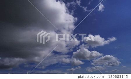 A dynamic summer sky spreads over the city of Okinawa A dynamic summer sky spreads over the city of Okinawa 129685145