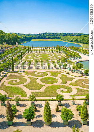 Beautiful gardens and fountains of the Palace of Versailles in France - Spectacular scenery of a World Heritage Site 129686359