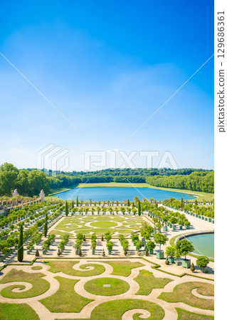 Beautiful gardens and fountains of the Palace of Versailles in France - Spectacular scenery of a World Heritage Site 129686361