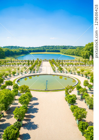 Beautiful gardens and fountains of the Palace of Versailles in France - Spectacular scenery of a World Heritage Site 129686428