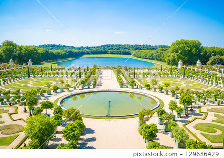 Beautiful gardens and fountains of the Palace of Versailles in France - Spectacular scenery of a World Heritage Site 129686429