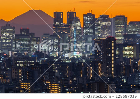 "Tokyo" Shinjuku skyscrapers and Mount Fuji at dusk 129687039