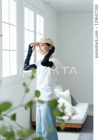 Full body UV protection before going out 129687388