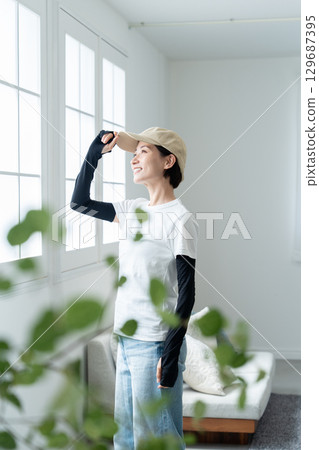 Full body UV protection before going out 129687395