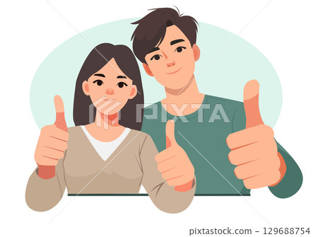 A man and woman give a thumbs up and smile with friendly expressions. A man and woman give a thumbs up and smile with friendly expressions. 129688754