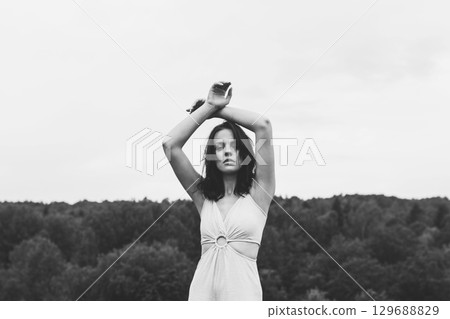 Monochrome Portrait of a Woman in Nature Monochrome Portrait of a Woman in Nature 129688829