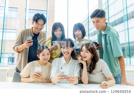 Young college student smartphone Young college student smartphone 129688858
