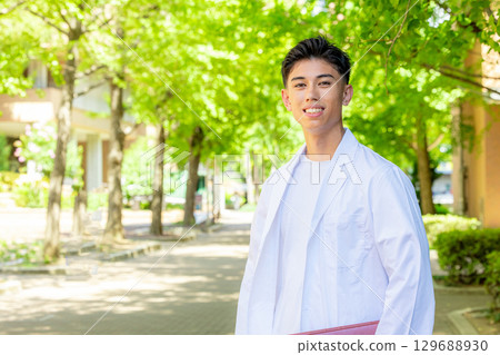 A white coat with a file A white coat with a file 129688930