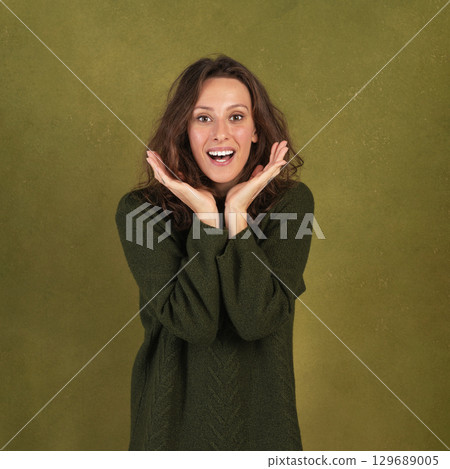 Exited woman studio portrait 129689005