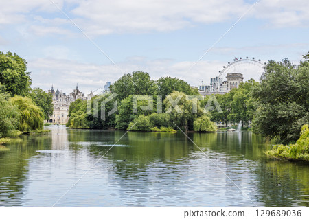 St James Park Lake with London Eye View, Lush Summer Greenery and Reflections, London St James Park Lake with London Eye View, Lush Summer Greenery and Reflections, London 129689036