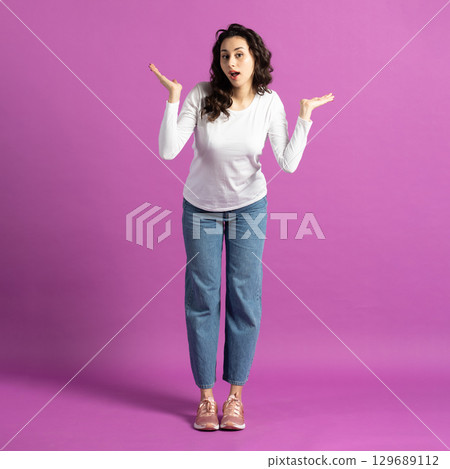 Woman holding hands up with excitement facial expression 129689112