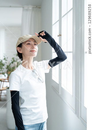 Full body UV protection before going out 129689258