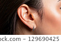 Beautiful female ears 129690425