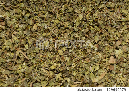 Macro Texture of Dried Oregano. Organic Spice Ingredient. Macro Texture of Dried Oregano. Organic Spice Ingredient. 129690679