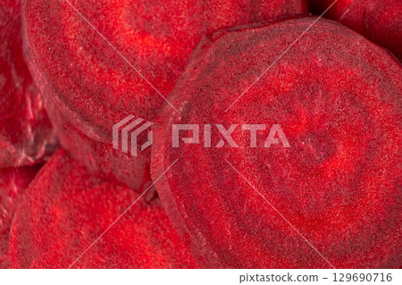 Fresh Uncooked Beetroot Cut into Circular Slices 129690716