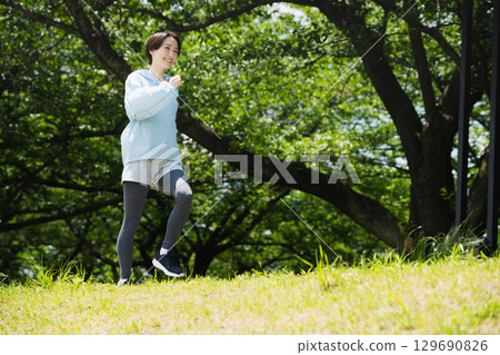Young woman running sports image Young woman running sports image 129690826
