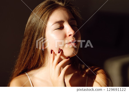 Portrait of beautiful woman without makeup with imperfect skin. Acne skin. Pores on skin of face. Portrait of beautiful woman without makeup with imperfect skin. Acne skin. Pores on skin of face. 129691122