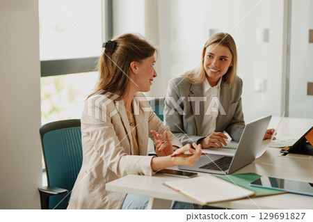 A Collaborative Business Discussion in a Modern Office Space Promotes Growth and Innovation A Collaborative Business Discussion in a Modern Office Space Promotes Growth and Innovation 129691827