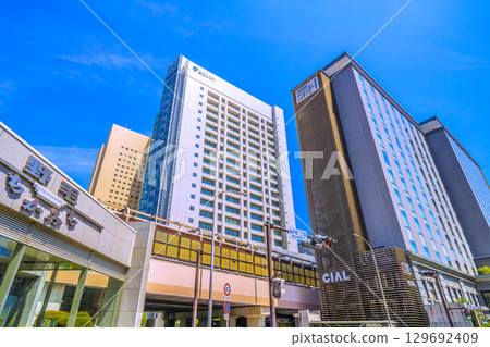 Yokohama cityscape in Japan, Sakuragicho Station South ticket gate (west exit) side. Hotel Mets and Fuji Soft are visible from Sakuragicho 2-chome Yokohama cityscape in Japan, Sakuragicho Station South ticket gate (west exit) side. Hotel Mets and Fuji Soft are visible from Sakuragicho 2-chome 129692409
