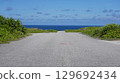 A view of Shiratorizaki, Miyako Island, where a single road stretches out towards the sea 129692434