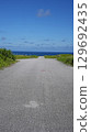 A view of Shiratorizaki, Miyako Island, where a single road stretches out towards the sea 129692435