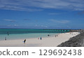 A plane approaching 17END with the blue sea and sky in the background 129692438