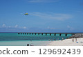 A plane approaching 17END with the blue sea and sky in the background 129692439