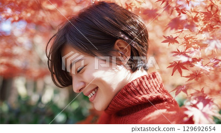 Autumn leaves and women 129692654