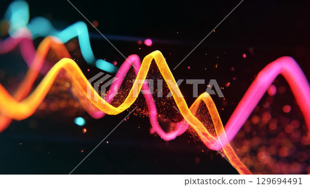 Close-up colorful visualization of stylized sound waves in orange, pink and blue tones with glowing particles 129694491