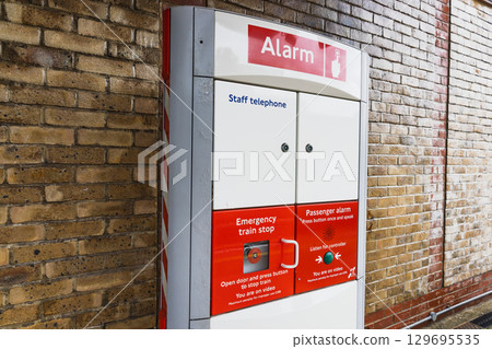 Emergency Alarm Box at Underground Subway Station Corridor 129695535