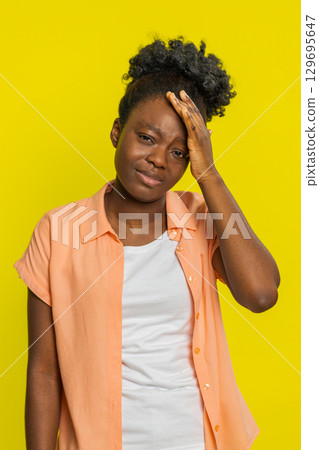 Sad young woman loses becoming surprised by lottery results bad fortune loss unlucky fortune news 129695647