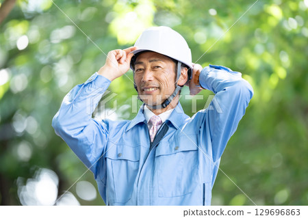 Men in work clothes Fresh green Men in work clothes Fresh green 129696863