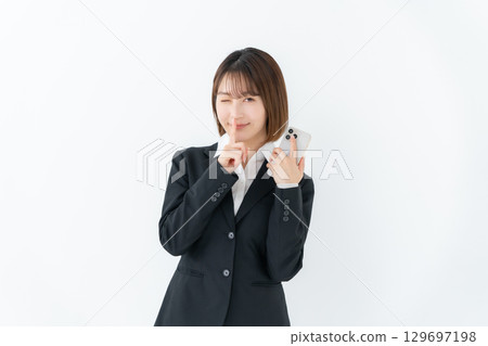 Young woman business smartphone secret 129697198