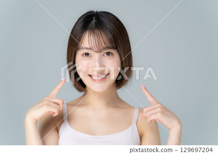 Dental care beauty young woman 129697204