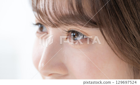 Young woman's eyes close-up Young woman's eyes close-up 129697524