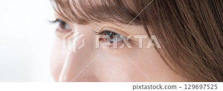 Young woman's eyes close-up Young woman's eyes close-up 129697525