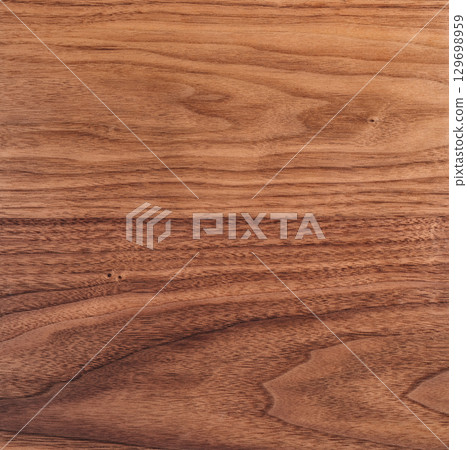 Texture of black walnut surface with oil finish Texture of black walnut surface with oil finish 129698959