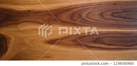 Black walnut wood texture from two boards oil finished 129698960