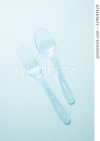 Plastic spoon and fork Plastic spoon and fork 129699429