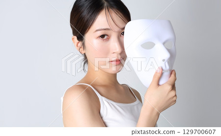 Woman with a mask Beauty image 129700607