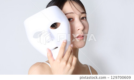 Woman with a mask Beauty image 129700609