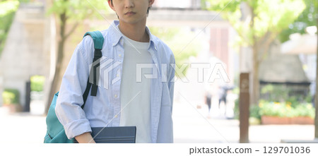 Male student in blue shirt, bust up Male student in blue shirt, bust up 129701036