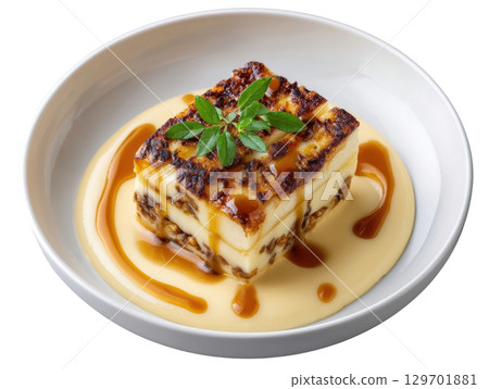 Layered Roasted Celeriac Terrine with Smoked Cheddar and Caramelized Fig drizzled with Walnut Jus and Celeriac Oil 129701881