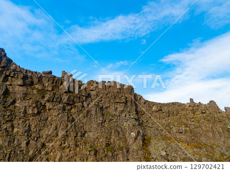 Geological formations in nature. Geology shapes landscapes. volcanic mountain stony rock. Mountain landscape nature. geology concept. geological volcanic rock ridge. Mountain nature environment 129702421