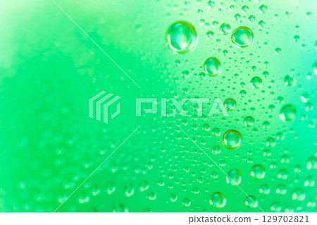 Water droplets/green background material Water droplets/green background material 129702821