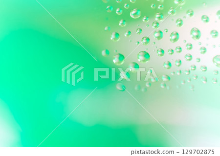 Water droplets/green background material Water droplets/green background material 129702875