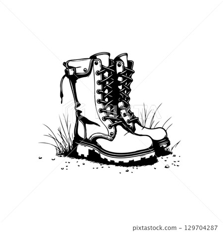 Detailed vector illustration showcasing a pair of sturdy work boots amidst subtle grass accents ideal for design projects 129704287