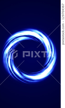 Vivid swirling blue energy ring glowing against a dark space background Vivid swirling blue energy ring glowing against a dark space background 129704367