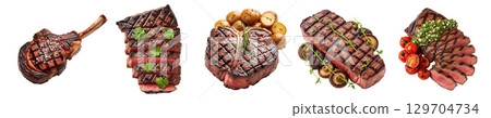 Five isolates of different types of grilled steaks are displayed on a white background. 129704734